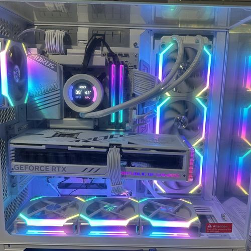 White custom PC with RGB fans and liquid cooler